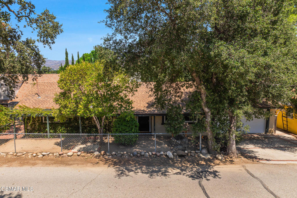 Nestled in the scenic Santa Monica Mountains, this charming 2-bedroom, 1-bath home offers comfort, character, and convenience. The upgraded kitchen features modern finishes and flows seamlessly into a cozy family room--perfect for everyday living. A separate laundry area adds functionality, while the delightful studio provides a versatile space that can serve as a sitting room, library, or creative retreat. Enjoy easy access to shopping, dining, and the freeway, all while being surrounded by the natural beauty of the mountains.