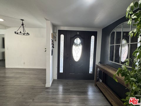 Photo of 9725 Kimberly Avenue, Montclair, CA 91763 (MLS # 26917443)