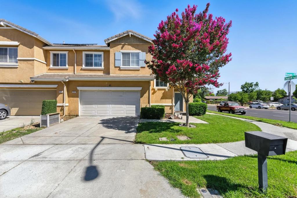 Step into comfort and convenience with this well kept 3-bedroom, 2.5-bath home located in a welcoming Gilroy neighborhood. This two story residence offers a spacious open concept layout, connecting the living and dining areas making it deal for both relaxing and entertaining. The kitchen is light filled and functional, featuring stainless steel appliances and plenty of cabinet space for storage. Upstairs, the generous primary suite includes a walk-in closet and private bathroom with dual sinks. Two additional bedrooms provide space for family, guests, or a home office. This home also includes a cozy fireplace, an attached two-car garage, a separate laundry room, and a low maintenance backyard perfect for outdoor dining or unwinding. Just minutes from local parks, schools, shopping centers, and Hwy 101, this location is ideal for families and commuters. Don't miss the chance to make this move in ready home your own!