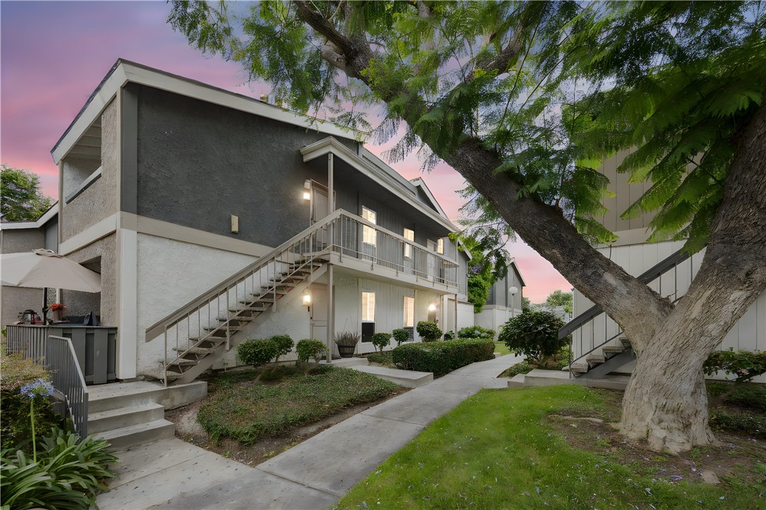 Discover comfortable, convenient living in this bright 1 bedroom, 1 bath upstairs corner condo in Santa Ana’s Lakeshore community. With approximately 621 sq ft of thoughtfully laid-out space, the open living area is anchored by a cozy fireplace and sliding-glass doors that lead to your private balcony. The adjacent kitchen features generous countertop space and ample cabinetry, creating an ideal flow for everyday living.
The spacious bedroom offers wall-to-wall closets, and the well-appointed bathroom completes the home’s efficient design. Each unit includes one assigned carport stall plus an additional community parking permit for added convenience. As a Lakeshore resident, you’ll enjoy on-site tennis courts, a laundry facility, and a sparkling pool with spa. Perfect as a starter home or an investment opportunity, this turnkey condo is ideally located near shopping, dining, and major freeways.
Priced to sell fast, this opportunity won’t last—don’t wait to schedule your showing!