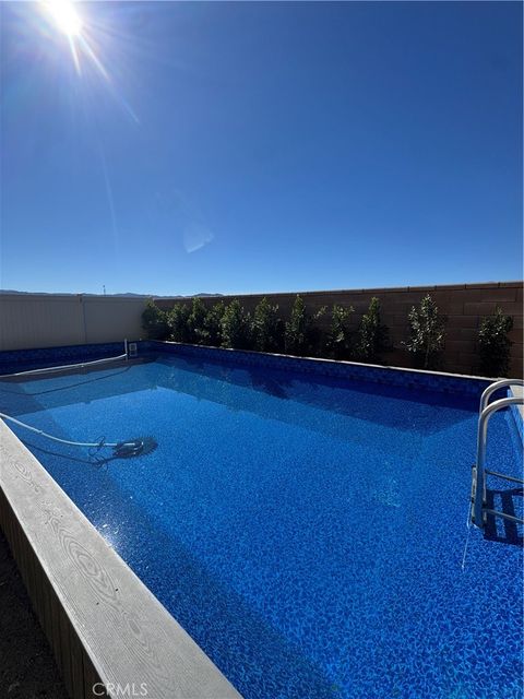 Photo of 19553 Hanging Rock Road Rd, Lake Elsinore, CA 92532 (MLS # DW25263024)