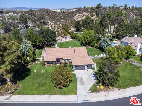 Photo of 15555 Bronco Drive, Canyon Country, CA 91387 (MLS # 26992193)