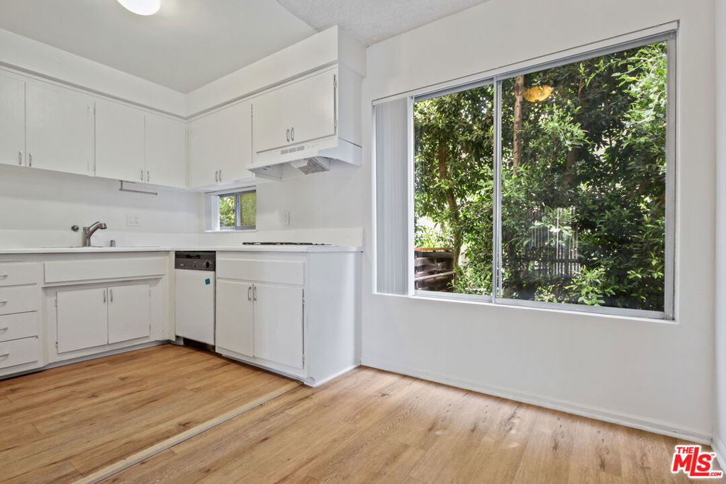 Located just above the Sunset Strip, 1140 N Clark St #206 is a stylish and charming two bedroom unit in the heart of West Hollywood. This residence features an open-concept layout, large windows that flood the space with natural light, and a private balcony perfect for morning coffee or evening sunsets. The well-maintained building offers secure entry and gated parking, all just steps from premier restaurants, cafes, and nightlife along Sunset Blvd. A perfect blend of comfort, convenience, and vibrant city living.