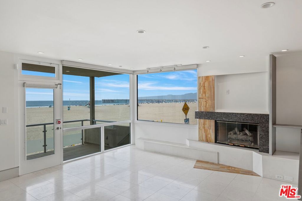 OCEANFRONT NORTH CORNER WITH DIRECT BEACH ACCESS + ENORMOUS OCEANFRONT BALCONY!!! 3 Large bedrooms + 3 Bathrooms + 3 Car Parking with Views from Catalina to Malibu. Oceanfront Primary suite features a large soaking tub, over sized shower, dual vanities and walk-in closet. Gorgeous Gourmet Kitchen with Stainless appliances, wooden cabinetry, stone counters + a great eat-in bar space open to a spacious dining area. The second bedroom has ocean views with a beautiful ensuite bath and plenty of closet space. The third bedroom is lovely with ample closets and light. The guest bath has a walk-in shower + built in sauna. Laundry room inside. Watch the sunsets nightly, walk to many coffee shops, restaurants, Abbot Kinney, the canals and all of the wonderful offerings of the area.