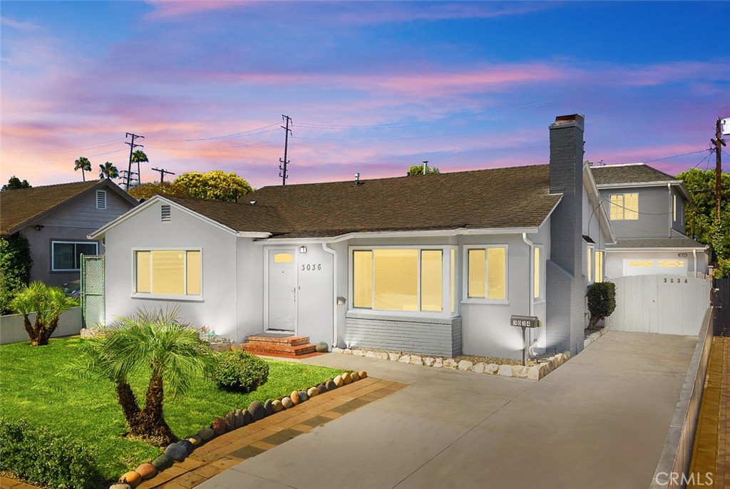 Welcome to this exceptional, move-in-ready home in the heart of Westside Village, offering a beautifully remodeled main residence plus a fully permitted 2-story ADU built in 2022—perfect for extended family, rental income, or a private guest retreat. Located in the award-winning Clover Avenue Elementary School District, this rare offering blends timeless charm with contemporary upgrades and incredible flexibility.
The main house features 3 bedrooms, 2 bathrooms, and approximately 1,697 sq.ft. of thoughtfully designed living space. Enjoy the bright and airy living room with a cozy fireplace, oversized windows, and an abundance of natural light. The updated kitchen boasts custom cabinetry, quartz countertops, and ample storage. The spacious primary suite includes a walk-in closet and remodeled en-suite bath with dual sinks. All bedrooms are generously sized, and the second bathroom has been updated with modern fixtures and finishes.The ADU adds approximately 1,165 sq.ft. and includes 2 en-suite bedrooms, 2.5 bathrooms, a full kitchen, in-unit washer/dryer, and its own private entrance—ideal for guests, tenants, or home office use. Each unit has its own tankless water heater, and utilities are shared between the two homes.The private backyard with mature trees, creating a peaceful retreat with plenty of room for outdoor dining, entertaining, or relaxing. There is a 1-car attached garage plus ample driveway parking.
Additional features include: Douglas Hunter blindsCentral heating & air in the main house, Tankless water heaters, Newer flooring & finishes throughout. Recessed lighting Prime Westside location just minutes from Trader Joe's, downtown Culver City, Metro E Line, Santa Monica, and major tech hubs including Google HQ Enjoy quick access to the 10 & 405 freeways, beautiful parks, schools, shops, and more. Whether you're looking for a multigenerational living setup, rental income potential, or simply more space in an A+ location—this home has it all!