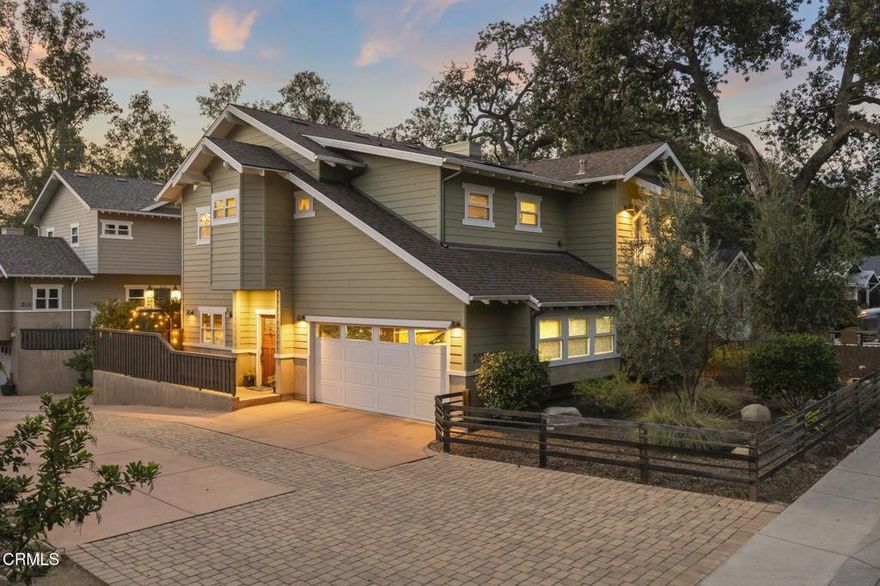 Welcome to 207 S. Blanche, a beautifully designed Craftsman-style home located just two blocks from downtown Ojai. Designed by noted local architect Mark Whitman and built in 2014 by contractor Scott Loomis, this two-story residence offers over 2,100 square feet of thoughtfully crafted living space. The main level features wood flooring, high ceilings, and an open-concept kitchen with custom cabinetry, ample counter space, and a breakfast bar. The living room includes a gas fireplace and French doors that open to a private patio. A flexible den or office with built-in window bench and a powder bath complete the first floor. Upstairs, all three bedrooms offer access to either a private balcony or a shared deck, and each features vaulted ceilings. The spacious laundry room is located upstairs for added convenience. The primary suite includes a large walk-in closet and an en suite bath with soaking tub, separate shower, and dual vanities. A residential elevator provides additional accessibility. The home also includes an oversized attached two-car garage. This is one of only three custom homes built on this quiet street in 2014. With no HOA or monthly fees, and a location close to Libbey Park, the farmers market, the Ojai Valley Trail, and downtown shopping and dining, this home offers a convenient in-town lifestyle with low-maintenance outdoor spaces.
