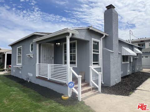Photo of 10318 S Manhattan Place, Los Angeles, CA 90047 (MLS # 26859153)