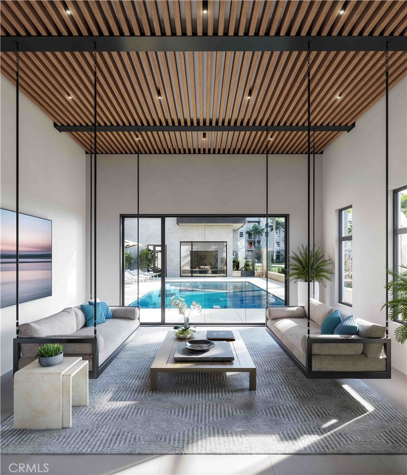 Just one of four remaining residences, this generous 3 bedroom and 2.5 bathroom residence features an open and airy floorplan with approximately 2,326 square feet and a private 100 square foot terrace. This half-floor residence, with a great room designed to flow effortlessly onto the terrace, is punctuated by triple-sliding window walls, and is move-in ready.
The centrally located kitchen with views is finished in custom millwork and countertops, and outfitted with Wolf and Subzero appliances. The light-filled primary suite is tucked away for privacy, with a spacious walk-in closet, and en-suite bath replete with a large soaking tub, spa-sized shower, and custom dual vanity.
With 10-foot ceilings and walls of glass, Residence 2 embodies casual sophistication designed to enhance the Newport Beach lifestyle. Tailored amenities include a serene and heated pool and spa, resort-inspired cabana, and state-of-the-art fitness center. The bespoke lobby provides direct elevator access to the residence, while owners enjoy private 2-car garages with storage and 14'foot ceilings.