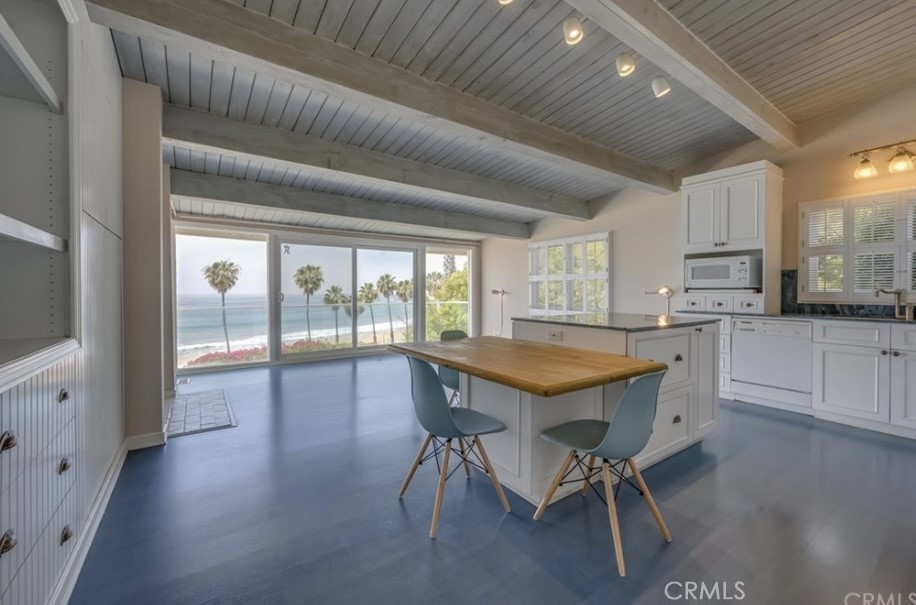 Location, location, location. Oceanfront beach house in Portuguese Bend Beach Club (PBC). There are 180 degree views of the ocean directly out your living room window, and you can also see Catalina. No homes are located in front of you, just beach and ocean. Watch dolphins and surfers from your living room. PBC is a private beach and gated oceanfront community. This property is truly spectacular!!! Plans to remodel and fix the minor land movement damages have been submitted to the city. House will be sold as-is. Portuguese Bend Beach Club is a private, gated community with amazing homeowner amenities. Come see for yourself.