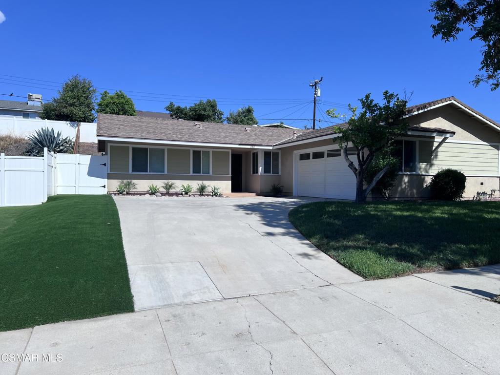 Turnkey and tastefully upgraded single-story home in a quiet Simi Valley neighborhood! This 3-bedroom, 2-bath residence offers 1,244 sq ft of stylish living space, thoughtfully remodeled for comfort and convenience. The kitchen shines with granite countertops, a brand-new Whirlpool range, dishwasher, and microwave, plus a stainless-steel refrigerator included for move-in ease. A pendant lamp adds charm to the dining area, perfect for cozy meals or entertaining.Enjoy smooth ceilings, recessed LED lighting in the living room and bathrooms, fresh custom interior paint, bullnose corners, dual-pane windows, and raised panel doors throughout. No carpeting--just custom tile flooring through common areas and bathrooms and laminate wood flooring in the bedrooms, with closet organizers in every room for smart storage.Both bathrooms feature custom flagstone finishes, modern fixtures, and new shower heads. Central air and heating ensure year-round comfort. Outside, the backyard has been refreshed with new sod, brand new gravel on both sides, a cedarwood side fence, and a cleared hillside which will all be maintained by the provided gardener. The front yard boasts decorative landscaping, a concrete driveway, and artificial turf on one side for low-maintenance and extra curb appeal.A true gem near parks, schools, and shopping--this move-in-ready home blends style, function, and location. Come see it today!