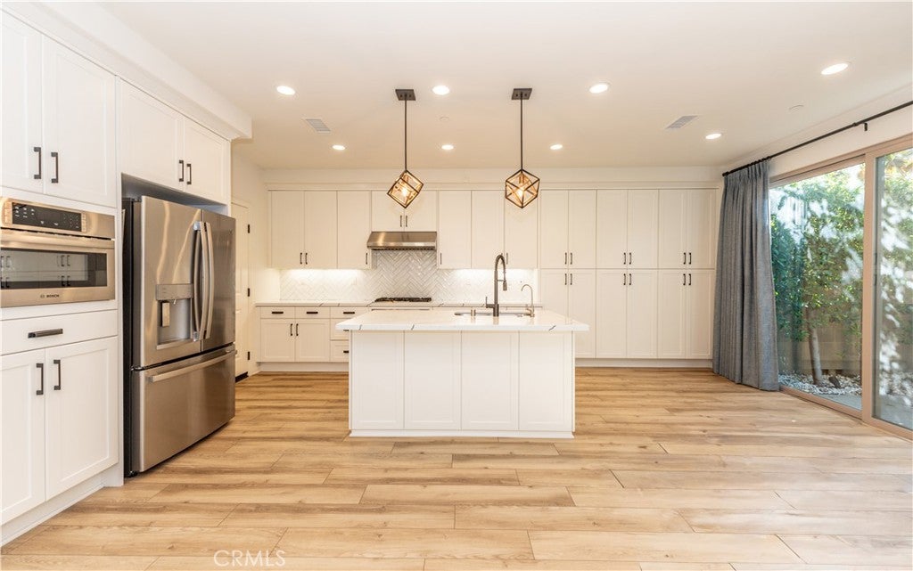 Photo of 115 Okra, Irvine, CA 92618 (MLS # OC26131959)