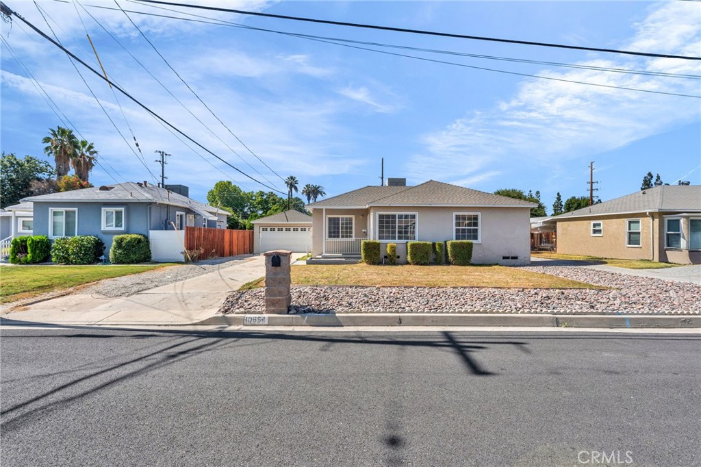 Classic South Redlands bungalow on a 7,187± SF lot, built in 1952 with 2 beds, 1 bath, and approx. 845 SF. An efficient, light-filled layout anchors the home, with well-scaled bedrooms and a full bath, plus original details that add character. A detached 2-car garage sits behind the house—ideal for storage now and a future workshop or studio (buyer to verify ADU potential). The wide backyard is ready for entertaining, gardening, or expansion. Convenient location minutes to Loma Linda University & Medical Center, Redlands Community Hospital, shopping, and freeways; nearby schools include Mission Elementary and Redlands Senior High.