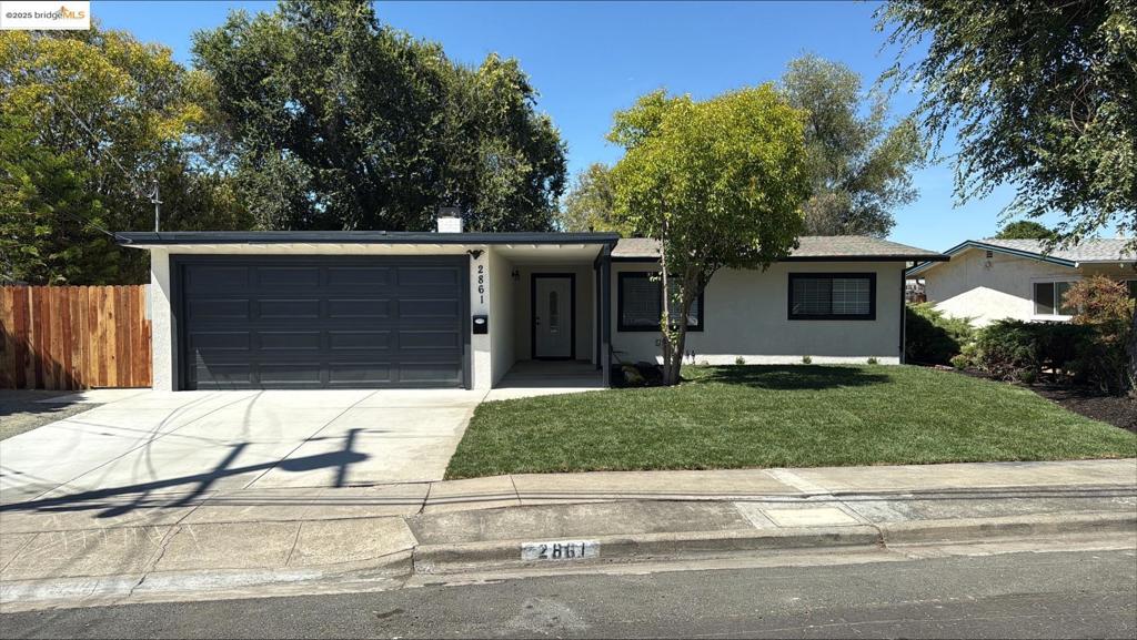 Wow! Nicely updated home with new kitchen cabinets, stone counters, stainless steel apppliances, New mini split for heting and AC, new exterior and interior, new 5 1/4" baseboards, new carpet, and updated bathroom, with a new bathroom, new front landscaping. Close to shopping and freeways. This one is a must see.