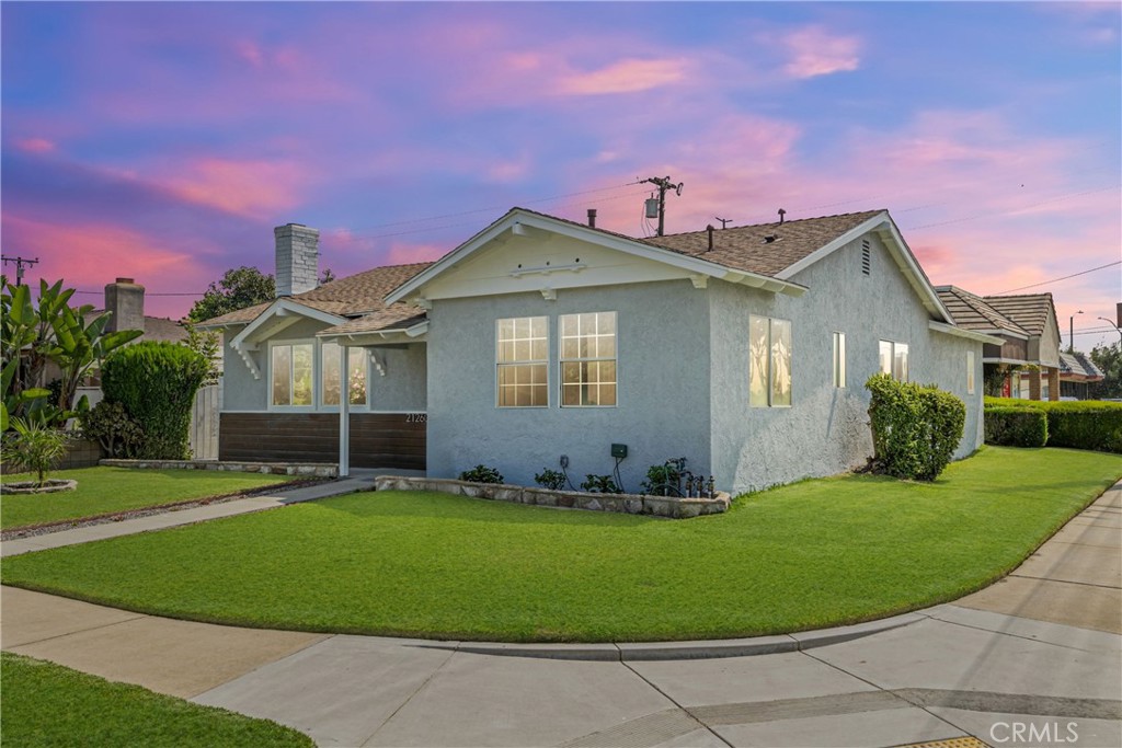 South Bay corner lot home with stylish upgrades. Thoughtful design meets modern convenience in this fully renovated 3-bedroom, 2-bathroom home offering approximately 1,395 SQ.FT. of light-filled living space on a 6,026 SQ.FT. corner lot. The open layout features wide-plank flooring, recessed lighting, and a sleek kitchen with quartz countertops, soft close cabinetry, and stainless steel appliances, all seamlessly connected to the living and dining areas, ideal for both entertaining and everyday living. The spacious primary suite bedroom includes access to the backyard patio and a modern en-suite bath with a double vanity, brass fixtures, and a striking tile shower with glass enclosure. Two additional bedrooms offer flexible use as guest rooms, home offices, or creative spaces, each designed with comfort and function in mind. A private, dedicated laundry area adds everyday convenience, while the detached 2-car garage includes EV charging capability. The outdoor space features fresh landscaping with irrigation, patio with ambient string lighting, and plenty of room to relax or entertain. Additional upgrades include new windows, an updated electrical panel, smart thermostat, and newer HVAC. This South Bay home offers easy access to major freeways, local parks, shopping, and coastal cities. Bringing lifestyle and convenience together in one turnkey package.