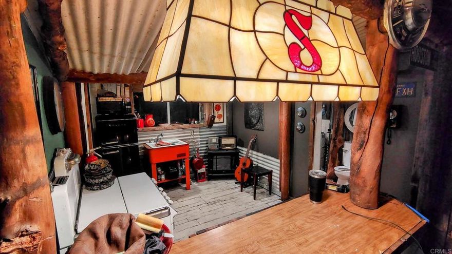 INVESTORS DREAM!  This property is a blank canvas on a beautiful street with all kinds of potential. Start your orchard and watch it grow. Just a little over 5 miles to I-15 you can live a country life but be only a short distance to services.