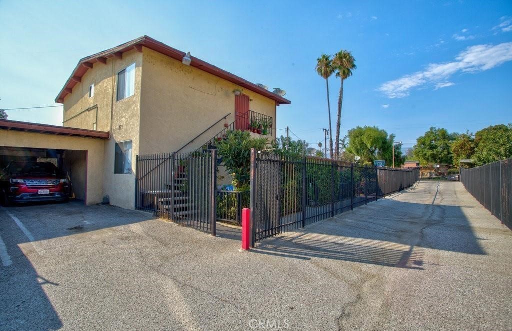 Two bedroom one bath, upstairs unit with private yard and two space carport.