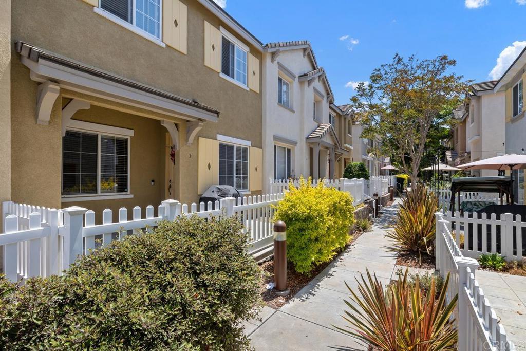 DON'T MISS THIS STUNNING 3-bedroom, 2.5-bath townhome in the desirable Otay Ranch area! This beautiful residence combines comfort and stylish design, which includes an attached one-car garage with additional storage. This spacious floorpan creates an open concept, which flows effortlessly into the family, kitchen and dining room areas with extended patio. The kitchen boasts stainless steel appliances, generous cabinet space, a walk-in pantry, and more. Upstairs, the primary bedroom offers ample space, a walk-in closet, and an en-suite bathroom with dual sinks and a tub/shower combo. Two additional bedrooms provide flexibility for family, guests, or a home office, while the second full bathroom with dual sinks adds convenience for everyone.Enjoy community amenities such as a pool, volleyball, basketball courts, and a playground, all within walking distance of nearby restaurants, shops, top-rated schools, and parks! Won't last long!