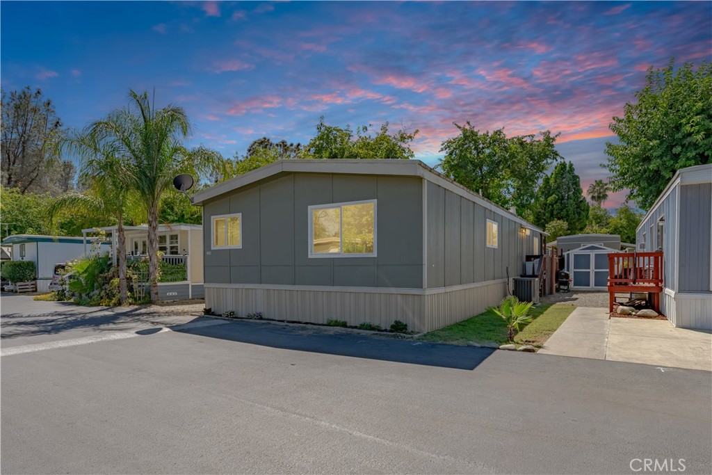 RARE FIND with over $50,000 in upgrades! Welcome to this beautifully updated 4 bedroom, 2 bathroom home offering 1,440 sq. ft. of stylish and comfortable living in an all-ages park. Inside, you’ll love the brand new kitchen featuring custom cabinets, butcher block countertops, and stainless steel appliances. Both bathrooms have been refreshed with custom cultured marble surrounds (including updated plumbing) and a new vanity in the guest bath. A new central HVAC system keeps the home perfectly comfortable year-round, and you’ll appreciate the convenience of an indoor laundry room, and the roof was redone 4 years ago. The spacious dining room features a built-in china hutch with glass doors, and the entire home is clean, bright, and move-in ready. This well maintained park offers a lifestyle you’ll love with access to the Feather River, walking paths, fishing, swimming, a dog park, basketball hoop, horseshoe pit, and even a convenience store. One of the biggest highlights? This is one of the only homes in the park with a fully fenced yard—perfect for pets! There’s even a dog house under the shade tree in the backyard. If you’ve been looking for a spacious, updated, and affordable home in a family-friendly community, this one is truly a must-see!