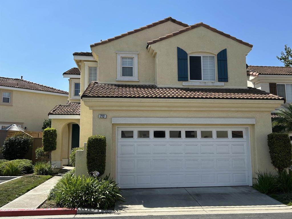 This beautifully updated Mediterranean-style home in the highly sought-after Mission Point community perfectly blends comfort, style, and indoor-outdoor living. Boasting three spacious bedrooms and two and a half bathrooms, the home features an open-concept layout with designer paint, modern flooring, and a remodeled kitchen complete with quartz countertops and contemporary finishes. The private backyard is designed for entertaining and relaxation, featuring a covered patio, built-in fireplace, and BBQ area—ideal for gatherings with family and friends or quiet evenings at home. Inside, natural light fills the space, creating a warm and inviting atmosphere throughout. Residents of Mission Point enjoy access to a range of community amenities including a clubhouse, pool, lighted tennis courts, tot lot, and more, making it perfect for active lifestyles and family fun. While the home is turnkey and move-in ready, it does require some minor aesthetic updates, offering a great opportunity to add your personal touch. This property combines functionality, charm, and an unbeatable location, making it an exceptional place to call home.