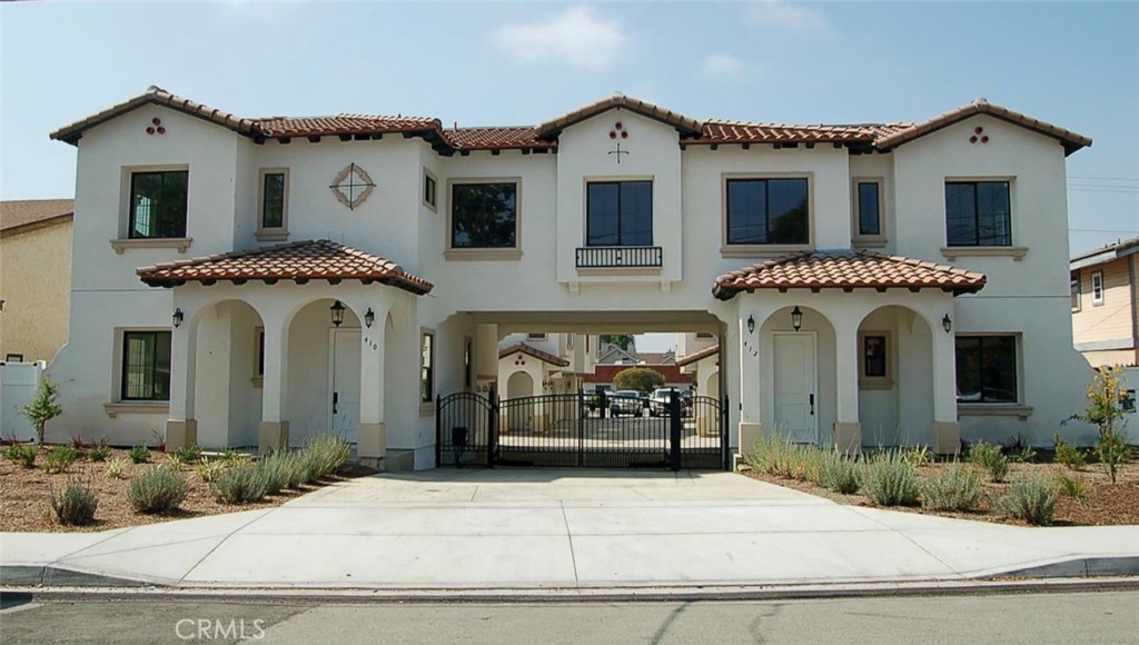 Now Available for Lease! Welcome to this stunning, newly built 3-story end-unit townhome located in an exclusive gated complex of just 6 homes in desirable Monrovia. Designed in a charming Mediterranean style, these units are located in an attractive complex offering enhanced privacy, gated and in a prime location, close to shops, dining, and transportation. The entry level features a welcoming foyer, a versatile den—perfect for a home office or guest room—a full bathroom, and direct access to a private patio, ideal for outdoor relaxation. On the second level, enjoy a spacious and light-filled living room with designer plank flooring, recessed lighting, and multiple windows. The contemporary kitchen is a chef’s dream, showcasing sleek quartz countertops, crisp white cabinetry, and state-of-the-art stainless steel appliances. This level also includes a bedroom with en-suite bath and an additional half bathroom for guests. The third level features two more generous bedrooms and a stylish full bath with a double sink vanity. Don’t miss your opportunity to lease this beautiful and thoughtfully designed home.