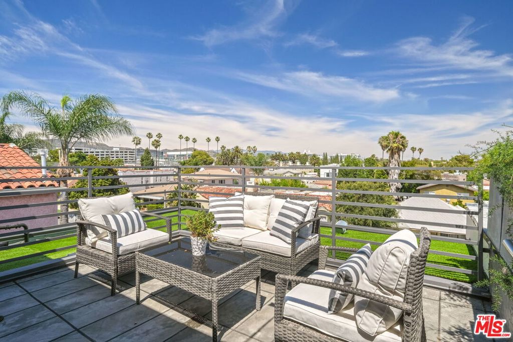 Welcome to 823 North Fuller, a luxurious collection of newly completed modern condos in the heart of West Hollywood with a coveted 95/100 walk score. This sleek & stylish 3 bed & 3.5 bath condo boasts an open main living floorplan for a seamless flow thru the living, dining & kitchen, w/contemporary fireplace, glass pocket doors & skylights. Cook to your hearts content in the gourmet kitchen w/expansive island, extensive cabinetry & Bosch ss appliances. At days end, unwind in your spacious master suite w/balcony, walk-in closet & sumptuous bath w/soaker tub, dual sink floating vanity & glass shower. Amenities include well-appointed guest rooms, decadent powder room, custom cabinetry, gated parking for 2 cars, in-unit laundry & 120SF rooftop patio for al fresco lounging/dining enveloped by city & mountain views. Move-in today & relish your coveted WeHo location, on a quiet street by Poinsettia park w/tennis courts & just steps from grocery stores, metro station, top shops & dining.