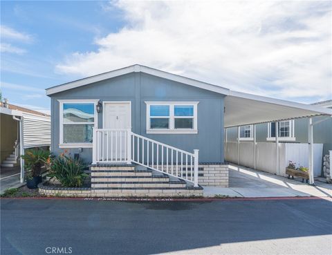 Photo of 21851 Newland Street #214, Huntington Beach, CA 92646 (MLS # OC26083475)