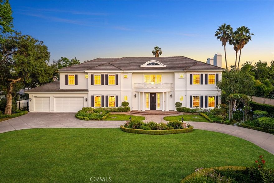 Location! Location! Location!This magnificent Colonial-style estate is located in Pasadena’s prestigious Chapman Woods neighborhood, adjacent to San Marino. Featuring 5 bedrooms and 4.5 bathrooms, it seamlessly blends timeless elegance with modern comfort. Designed by renowned architect Robert Tong and meticulously constructed by Mur-Sol, the residence sits on nearly half an acre of beautifully landscaped grounds, exuding sophistication and grandeur.A wide circular driveway leads to an impressive façade, where elegant columns and double doors create the stately presence of an estate home. Upon entering, you’re greeted by a soaring 25-foot foyer adorned with French stone flooring, creating a bright and elegant sense of space.

The formal living room features a modern marble fireplace and exquisite niche details, while the spacious, high-ceiling family room boasts upscale custom wood cabinetry, making it the perfect place for family gatherings and entertaining friends. The kitchen is designed in an open French style, featuring white carved cabinetry and a sophisticated stone center island surrounded by breakfast and dining areas that radiate both luxury and warmth.The first floor includes a versatile office and a separate guest suite. Upstairs, the well-planned layout offers two additional suites and two spacious bedrooms. The romantic and stylish primary suite includes an expansive walk-in dressing room and offers delightful views of the backyard, where you can enjoy the sights and sounds of lush gardens and the sparkling pool.The meticulously designed backyard is an entertainer’s paradise, complete with a swimming pool, spa, therapeutic jacuzzi, and BBQ area—perfect for gatherings of any size and all kinds of celebrations. Towering greenery surrounds the property, ensuring a private and tranquil environment.This exceptional residence combines traditional charm with modern functionality and boasts an excellent location close to the renowned California Institute of Technology (Caltech), Pasadena City College, and the vibrant Pasadena business district. Whether for personal living or as an investment, this is your ideal choice!