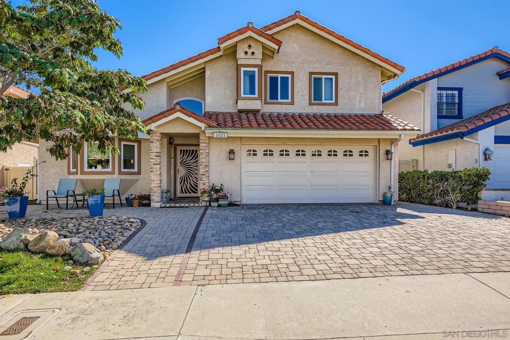 The home you have been waiting for is now on the market. This well maintained 2 story entertainment style home is located in the desirable neighborhood of University City with EZ access to highways 805 and 52. Looking for a home with solar ? This home has solar which is PAID for. Looking for a 220v EV charger ? Yes this home has it . The primary suite features 3 closets, 2 separate sinks/vanities, a shower, a jetted tub, private W/C, a retractable ladder to the attic and a balcony where you can sit and relax. 2 other bedrooms are upstairs. One of the upstairs bedrooms could be split to add an additional bedroom. The upstairs hall bath has an updated shower. Do you work from home ? There is a room downstairs with lots of shelving/storage and a murphy bed. Could be made into another bedroom. The living room and family room each feature a fireplace. A dining area is located off of the living room. Do you like to cook? The spacious kitchen offers a double oven with 2 warming drawers, Thermador 5 burner gas cooktop, trash compactor and built-in refrigerator. Lots of cabinet and counter space. Either enjoy the breakfast bar area or there is room in the family room to create another dining area. The kitchen overlooks the backyard perfecting for entertaining. This lovely home has engineered mahogany wood floors and travertine flooring. The home is located on a 9186 sq ft lot with a large deck behind the wall. Come and make this home your new home. *** See Supplement *** Per Seller : The separate laundry room has a sink. The Electrolux washer dryer set, 2024. The whole house water filter was replaced in 2024. The home has a "scrubber" air purifier. Most of the roof and gutters were renewed in 2021. Attic and duct insulation were added in 2022. Central AC replaced in 2021 plus additional AC split system upstairs were added. The furnace was replaced in 2023 or 2024. Water heater was replaced in 2023 or 2024. Whole house water filter system.