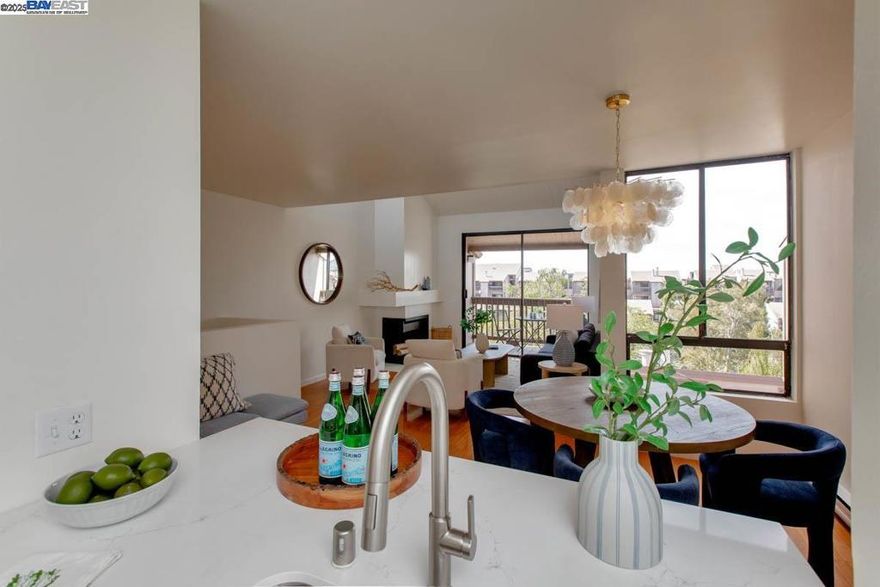 Located directly across the street from Alameda's beach and shoreline, this newly updated waterfront condo is part of The Willows HOA community and features 2 bedrooms, 1.5 bathrooms and a living room/dining room/kitchen great room. Features of this sunny 4th-floor home include a durable wood-style laminate floor on the main upper level, and new carpeting in the lower level bedrooms. Updates include new light fixtures, new quartz kitchen counters + a new stainless steel range + dishwasher, fresh interior paint + updated/refreshed bathrooms. Details include a dramatic vaulted great room ceiling, a fireplace + a balcony off the great room with partial water views. In-unit washer/dryer hookups. One covered parking space is assigned to the unit. Owners can take advantage of the HOA's many amenities such as an attractive clubhouse, a large pool + an in-ground spa, and a fitness center. The convenience of the home's close proximity to Trader Joe's and the South Shore Center's many attractions can't be overstated, while Washington Park and downtown Park St are just a few minutes away. With the sights and sounds of the SF Bay at your doorstep, this home truly feels like resort-style living at its best!
