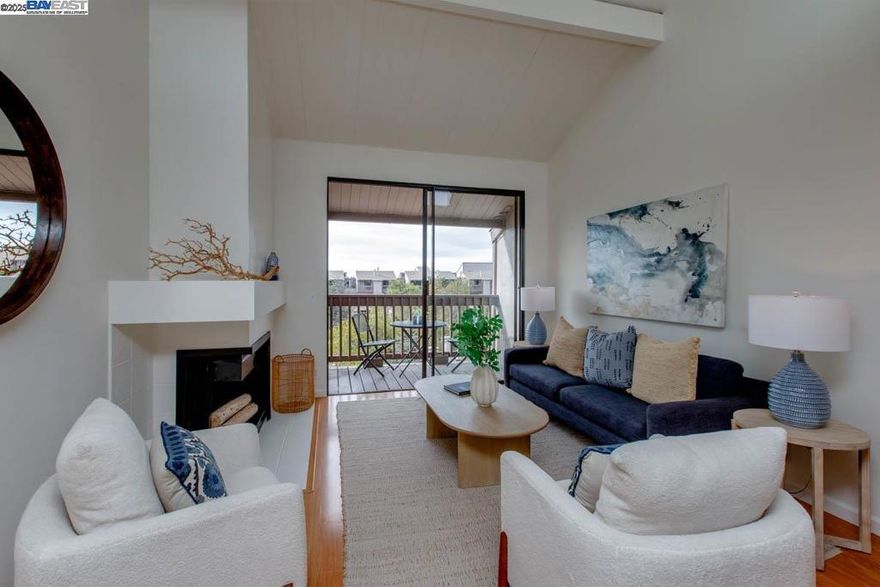 Located directly across the street from Alameda's beach and shoreline, this newly updated waterfront condo is part of The Willows HOA community and features 2 bedrooms, 1.5 bathrooms and a living room/dining room/kitchen great room. Features of this sunny 4th-floor home include a durable wood-style laminate floor on the main upper level, and new carpeting in the lower level bedrooms. Updates include new light fixtures, new quartz kitchen counters + a new stainless steel range + dishwasher, fresh interior paint + updated/refreshed bathrooms. Details include a dramatic vaulted great room ceiling, a fireplace + a balcony off the great room with partial water views. In-unit washer/dryer hookups. One covered parking space is assigned to the unit. Owners can take advantage of the HOA's many amenities such as an attractive clubhouse, a large pool + an in-ground spa, and a fitness center. The convenience of the home's close proximity to Trader Joe's and the South Shore Center's many attractions can't be overstated, while Washington Park and downtown Park St are just a few minutes away. With the sights and sounds of the SF Bay at your doorstep, this home truly feels like resort-style living at its best!