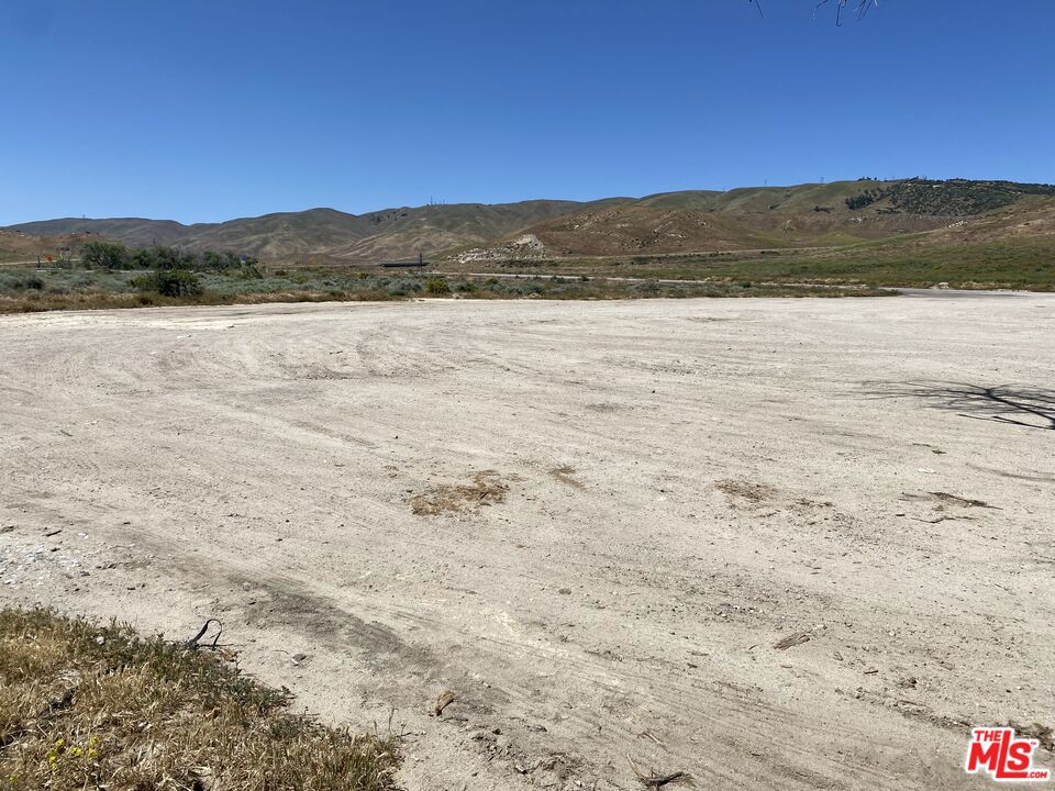 These 3 commercially zoned vacant lots, total approximately 60 acres of primarily flat land, located 25 miles North of Santa Clarita, 38 miles West of Lancaster and 40 miles South of Bakersfield. The lots are well-positioned at the intersection of the I-5 Fwy and the I-38 Hwy, on which approximately 250,000 vehicles pass by daily. Three Freeway on-ramps and Three Freeway off-ramps, ensure commercial businesses built on these lots, easy access to both Freeways. The current road infrastructure located on these lots is conducive to providing significant savings for potential developers. This is an excellent opportunity for developers and/or investors, to acquire this one-of-a-kind commercial investment in Los Angeles County. With Pyramid Lake only 5 miles to the South, the Tejon Ranch Commerce Center located 8 miles to the North and the Centennial Master Plan Community at Tejon Ranch located 3 miles to the East, the prospects of owing this commercially zoned acreage, are endless. Extensive Investigative Reports were completed by David Evans & Associates in 2022. @westsideland