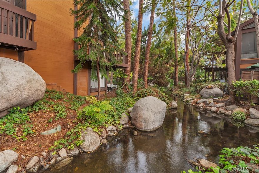 Welcome to Benton Bay, a beautifully maintained, gated community surrounded by tranquil ponds, mature trees, and resort-style amenities. This upgraded 1-bedroom, 1-bath upstairs end-unit condo offers comfort, style, and convenience all in one inviting package. Step inside to a bright, open living space featuring laminate flooring installed just two years ago. The updated kitchen boasts modern cabinetry and sleek finishes, while the remodeled bathroom adds a touch of spa-like relaxation. Enjoy the convenience of an in-unit laundry closet and the comfort of a walk-in closet in the spacious primary bedroom. Relax on your private balcony overlooking the lush community landscaping, or take advantage of the outstanding amenities—including a sparkling pool, fitness center, tennis courts, and a dog park perfect for your four-legged friends. This home also includes one assigned carport plus plenty of guest parking for visitors. Ideally located near shopping, dining, and freeway access, Benton Bay offers a serene retreat with easy urban convenience. Perfect for first-time buyers, young professionals, or downsizers seeking a low-maintenance lifestyle, this move-in-ready home is a true gem in one of Norwalk’s most desirable communities.