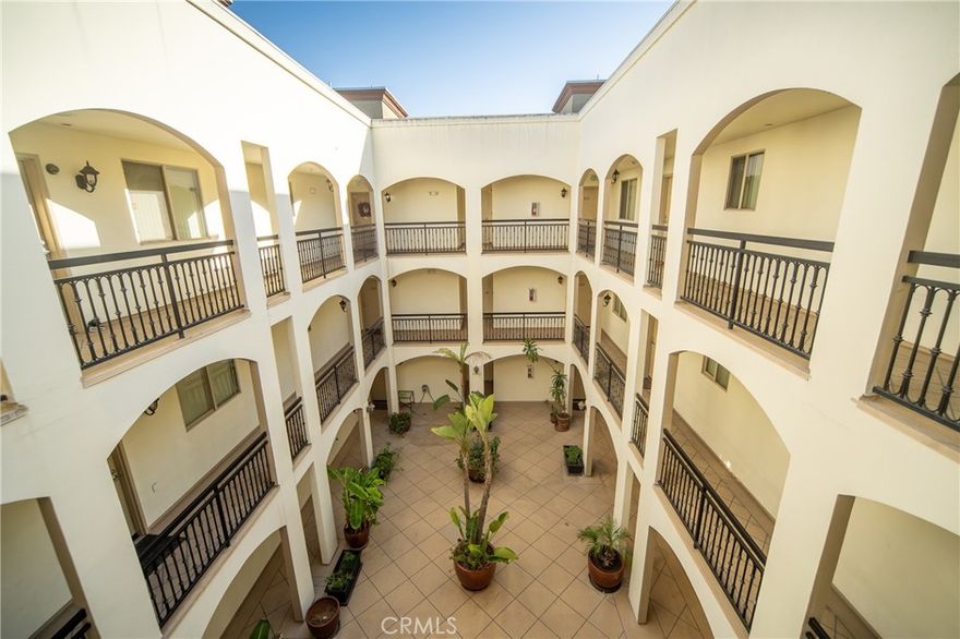 Top Floor Unit. Water and Trash included in the Monthly Rent.  Welcome to your dream Condo in the heart of Studio City! This beautifully Lighted, full of green serene trees updated and modern 2-bedroom, 2-bath unit with a second story loft offers the perfect blend of style, comfort, and unbeatable location. Step inside to discover Rich Hardwood floors throughout, a cozy fireplace, a separate Dining room, the spacious living room overlooking the private balcony, perfect for morning coffee or evening relaxation. The sleek kitchen features Travertine tile flooring, sparkling granite countertops, and Stainless Steel Appliances throughout the Open floor Kitchen—ideal for the home chef. Both bathrooms are equally refined, showcasing elegant tile work and quality finishes. Enjoy the convenience of a brand new, in-unit GE washer and dryer—also never been used! Tucked inside a gorgeous, well-maintained building with a lush, tropical-style courtyard, this unit provides a tranquil escape just blocks from Studio City’s best dining, the weekly Farmer’s Market, and minutes to CBS Studios, Universal Studios, and the Westside via nearby freeways and canyons. This rare gem won’t last long—make it your new home today!