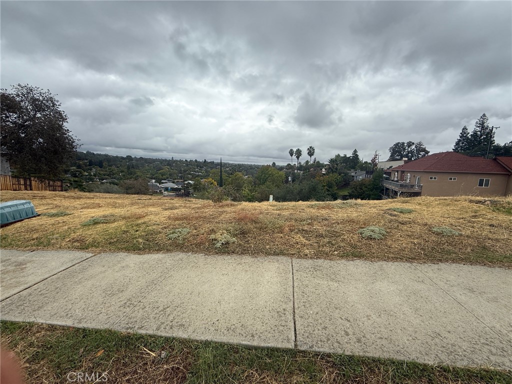 Welcome to 13 Hawley Trail, located in the desirable Acacia Park Estates Subdivision! This turnkey lot offers a rare opportunity to build your dream home on a quiet court location with three custom homes already completed. Situated less than a mile from downtown shopping, restaurants, the hospital, and schools, this growing neighborhood combines peaceful foothill views with convenience to all the city amenities. The lot is fully improved and ready for your building plans and features: street lighting, curbs/sidewalks, storm drains, and underground utilities at the street (individual permit and connection fees apply). Flexible financing may be available as seller will consider carrying financing with approved down payment and credit—making it easier than ever to get started. Come see for yourself and don’t miss this opportunity to build in a well-located community! — schedule your visit today!