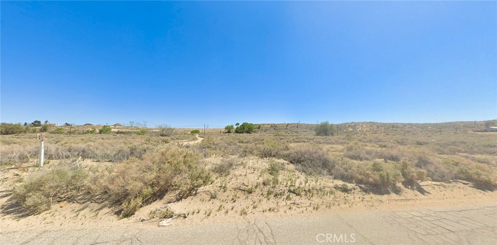 Positioned with captivating views of the river, valley, and the iconic Route 66 bridge, this 5.46-acre parcel in Victorville is a rare find for investors or homebuilders seeking scenic charm with solid infrastructure access. The property benefits from a power line running across it along Turner Road—offering a major utility advantage—while the legal easement and dirt road frontage provide clear accessibility. With Turner Rd cutting through the land, it’s well-suited for future development or a custom retreat that maximizes the panoramic outlook. Plus, seller financing is on the table, making this opportunity even more flexible for the right buyer. APN: 0472-171-32-0000. GPS: 34.57204, -117.33234.