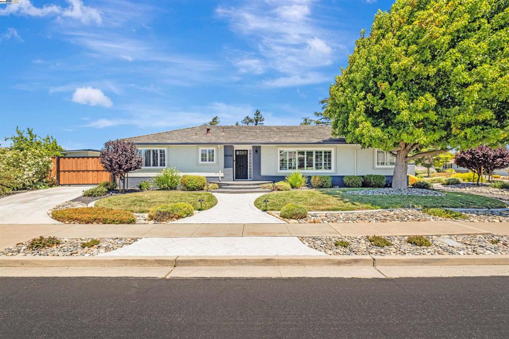 Nestled in the highly desirable Glenmoor neighborhood, this stunning home offers the ideal blend of location, space and modern upgrades around every corner! This single-story home has a masterfully designed open floor plan that features a picturesque living room with serene yard views, a gourmet kitchen and an expansive dining area. You’ll love the quality details throughout–a concrete tile roof, LVP flooring, remodeled bathrooms, central A/C, copper plumbing and Milgard windows. The gorgeously remodeled kitchen has a storage-rich island, granite counters, shaker cabinets, pantry and stainless steel appliances including a built-in gas stove. Offering rare flexibility, the home includes two spacious primary suites with ample closet space. Step into a backyard built for entertaining, including manicured landscaping, an outdoor kitchen with fire-finished granite counters plus two large sheds with electrical. This sizable lot has RV side access, space for a potential ADU or expansion. This one-of-a-kind home is in an excellent location, close to Meyer Park playground, rec courts and pool. Perfect for commuters, nearby 880, Dumbarton Bridge, BART & Centerville Station. Walking distance to great schools, shopping & local eateries. Don’t miss your chance to call this Glenmoor gem yours!