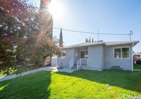 Photo of 8633 Bluffdale Drive, Sun Valley, CA 91352 (MLS # GD26028366)