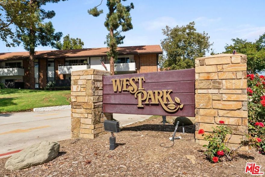 This spacious end-unit condominium offers an opportunity to own a new home at an unbeatable price. Open the front door and you are greeted by an expansive and open living area that flows seamlessly into the dining area. A fireplace, built-in cabinetry, and shelving add a touch of character and warmth to the living and dining areas. An outdoor private patio off of the living room, with oversized glass sliding doors, allows natural light to flood the unit and offers an opportunity to enjoy the breeze and fresh air. Next to the dining area is a kitchen with ample storage space. Benefits of the end-unit include privacy as well as additional windows, allowing light to enter the kitchen and dining areas. The unit boasts two large bedrooms. The primary bedroom is coupled by an ensuite bathroom and a large walk-in closet. The second bedroom and another full bathroom complete this large condo. Located in the sought-after West Park association of Westlake Village, community amenities include a sizeable pool, a relaxing hot tub, a community picnic and barbeque area, and lush landscaping. Two independent parking spots complete this unit. Move in now and enjoy the unit as-is with updates as you go, or make this unit your own with some cosmetic updates. Either way, this is a fantastic opportunity to get your foot into the market and enjoy a quiet and private home.