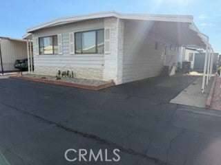 Photo of 1630 W Covina BLVD #108, San Dimas, CA 91773 (MLS # SR26200968)