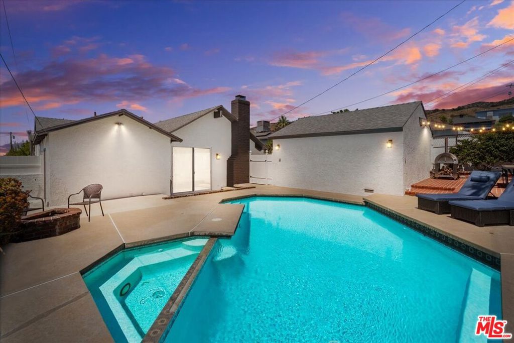 Move-In-Ready Burbank Gem with Modern Kitchen & Resort-Style PoolWelcome to 2950 N Lincoln St, a stunning 1,991-sq.-ft., 3-bed, 2-bath retreat in Burbank's prestigious Hillside District, where timeless elegance meets modern luxury. This move-in-ready home boasts a 3-year-old gourmet kitchen with sleek stainless steel appliances and custom cabinetry, a cozy fireplace, and a spacious primary suite. Outside, a sparkling pool and spa create a resort-style oasis on a 6,316-sq.-ft. lot, perfect for entertaining or relaxing. Behind the 2-car garage, a charming patio area evokes an Italian outdoor caf, offering a private, enchanting space for lounging and dining al fresco. Nestled in the highly sought-after Hillside Districtknown for its rising property values and serene, family-friendly vibethis home is steps from top schools, Disney and Warner Bros. studios, and local favorites like Porto's Bakery. In a competitive market where Hillside District homes appreciate rapidly, this turnkey masterpiece is a rare opportunity. Schedule your tour today!