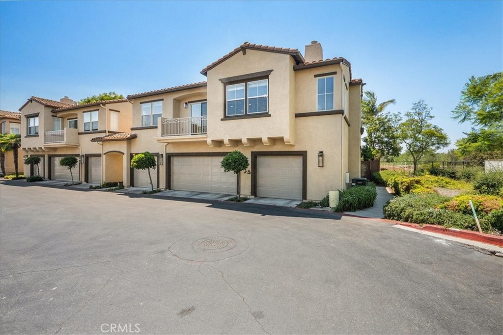 OWN A PIECE OF OCEANSIDE, CALIFORNIA! This gorgeous 2-bedroom, 2-bathroom condo is perfect for anyone who loves the beach, sunny weather, and scenic biking, walking, or running trails. On the first level, you’ll find a 1-car garage with upgraded epoxy flooring and direct access to the staircase leading to the second level. Upstairs, you’ll be welcomed by a bright living room featuring a cozy gas fireplace. The kitchen opens to the dining area, living room, and balcony—keeping you connected to the conversation while entertaining. Also on this level are two bedrooms and two bathrooms located on opposite sides of the property for ideal privacy. A full-sized LG washer and dryer, tucked neatly in a dedicated closet, complete the floor plan. When you’re not at the beach, enjoy the community pool and spa! Speaking of the BEACH, a paved trail right behind this property takes you straight there. This home is truly TURNKEY with upgrades and features including: epoxy garage flooring, window coverings throughout, an Ecobee Wi-Fi–enabled thermostat, a Schlage Wi-Fi–enabled deadbolt, freshly painted interior walls, new carpet in both bedrooms, an updated secondary bathroom, a recently purchased HVAC system, one additional assigned uncovered parking, and more! ALL MAJOR APPLIANCES ARE INCLUDED!