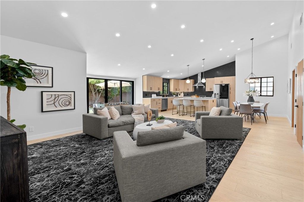 Photo of 5711 Ostrom Ave, Encino, CA 91316 (MLS # SR25237006)