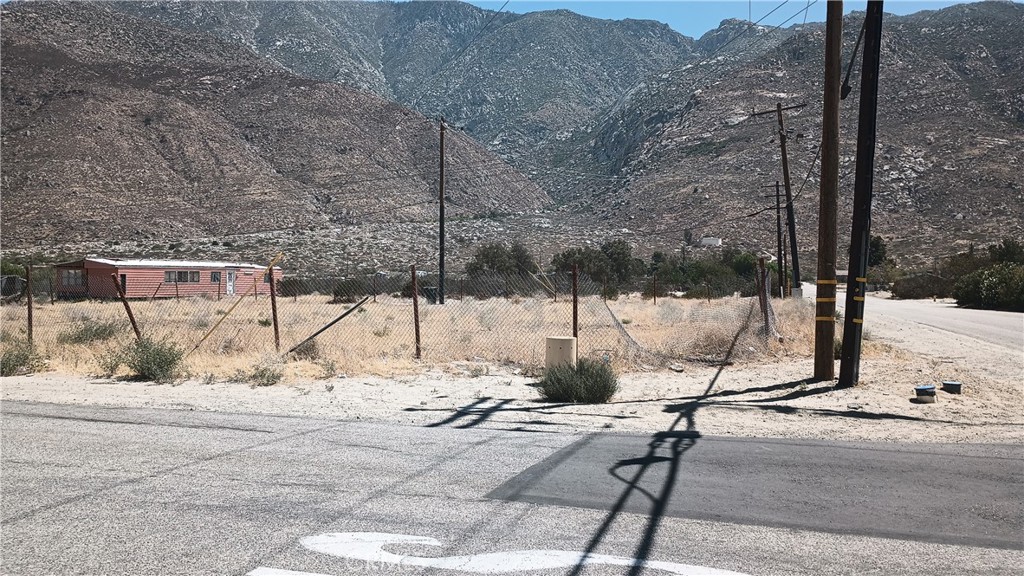 Fenced corner lot boasting 17,860 Sf with the water access in front of the property. The property also has the electricity available on both sides of the street. There is also a fire hydrant on one of the corners of the property. The area permits manufactured home installations as well as stick built homes . Buyer and buyer's agent to do their due diligence.
