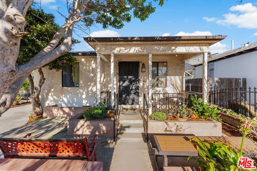 Welcome to 402 N McKinley Ave A Charming Home in the Heart of Historic La Colonia! Nestled in the vibrant and culturally rich La Colonia neighborhood, this beautifully maintained home perfectly blends comfort, history, and modern potential. Find gated Parking in the front and back off the home. Featuring an additional bedroom and bathroom thoughtfully added to maximize living space, this home is ideal for growing families or those who love to entertain. Step outside and enjoy the lush healthy avocado trees in the backyard, providing both shade and seasonal harvests. With plenty of room for an ADU (Accessory Dwelling Unit), you have the flexibility to create extra income, host extended family, or design your dream guest house. Located just 15 minutes from the beach, this home offers the best of coastal living while keeping you close to everyday conveniences. Top-rated schools, shopping centers, and dining options are just around the corner, making daily errands and nights out effortless. La Colonia is one of the most historic neighborhoods in the area, known for its deep community roots, vibrant traditions, and family-friendly atmosphere. On weekends, explore nearby Plaza Park, visit Heritage Square for local history, or enjoy the boutiques and eateries at Downtown Oxnard. For more outdoor fun, take a short drive to Oxnard State Beach Park or head to Channel Islands Harbor for boating, kayaking, and waterfront dining. Whether you're looking to raise a family, invest, or create a multi-generational living space, 402 N McKinley Ave is full of possibilities. With its desirable location, added living space, and endless potential, this is more than just a house it's the perfect place to call home. Key Features: Expanded layout with added bedroom & bathroom Healthy avocado trees in the backyard, Room to build an ADU for extra income or guests, Just 15 minutes to the beach, Close to schools, shopping, and dining, Located in the historic La Colonia neighborhood, Endless entertainment & recreation nearby, Don't miss the chance to own a piece of history in one of Oxnard's most sought-after communities.
