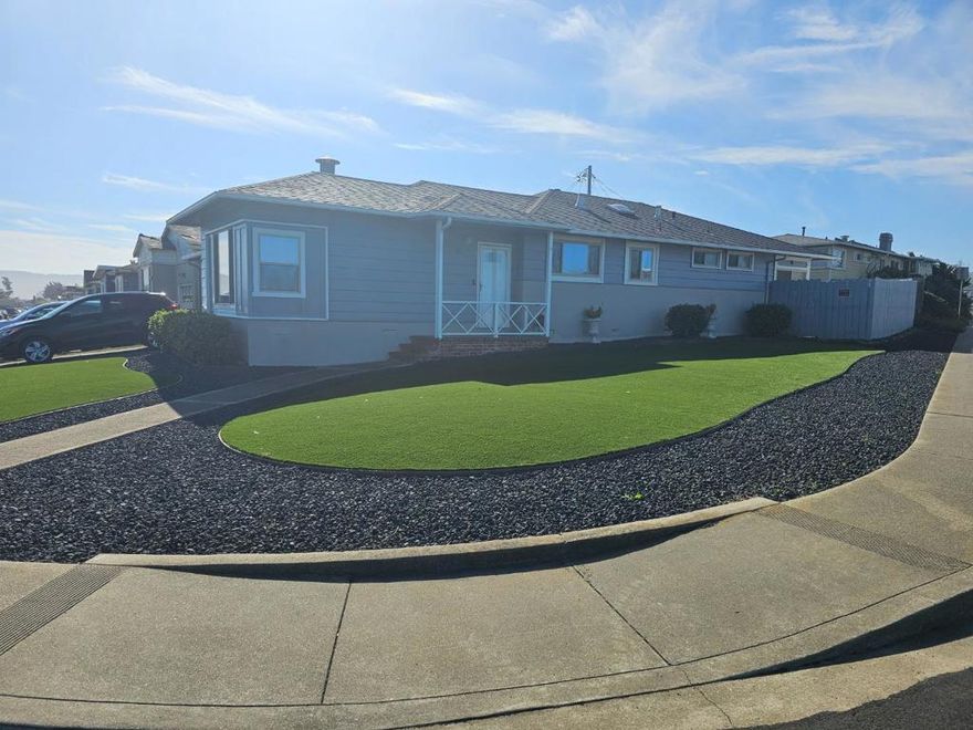 Welcome to this charming home in Daly City, offering 1,180 sq. ft. of comfortable living space. This house features three bedrooms, including more than one bedroom conveniently located on the ground floor, and two full bathrooms equipped with a shower and tub, and tile finishes. The kitchen is well-appointed with modern amenities such as an electric cooktop, formica countertops, dishwasher, garbage disposal, hood over range, and refrigerator, complemented by a skylight that bathes the area in natural light. Enjoy meals in the dining area, seamlessly integrated into the living room, which boasts a cozy fireplace for added warmth and ambiance.   The home features a combination of carpet and hardwood flooring, providing a versatile and appealing aesthetic. Central forced air heating ensures comfort throughout the cooler months. The property includes a two-car garage with laundry facilities conveniently located inside. This residence is situated within the Jefferson Elementary School District. With its practical layout and desirable amenities, this Daly City home is ready to meet your needs.