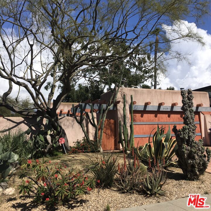 Attention builders/developers. Fabulous opportunity in Beautiful Westside Village. Large 6442 sqft Flat Lot, great location! This is a fixer with so much potential...Sold in AS IS condition. For those who have time and money to remodel: Charming Home w/authentic Southwestern curb appeal. Great Outdoor Patio Areas for indoor-outdoor living. Large Eat-in Kitchen, garden window & open floor plan to living & dining areas. Lounge & relax in this large primary suite w/en suite bath & huge walk-in closet & French Doors which open to a side garden. Hobby/painting studio or exercise rm, office/den w/decorative fireplace, direct access 2-car garage & 2 side by side parking spaces in the driveway, huge outdoor patio areas for entertaining. New roof & gutters as of 2017, Located in the Clover Avenue School District, a Blue Ribbon School. Easy access to SM, Century City, Westwood, Culver City, LAX, Downtown, Light Rail & the Beach. (note: photos are not all current) Easy to show by appointment.