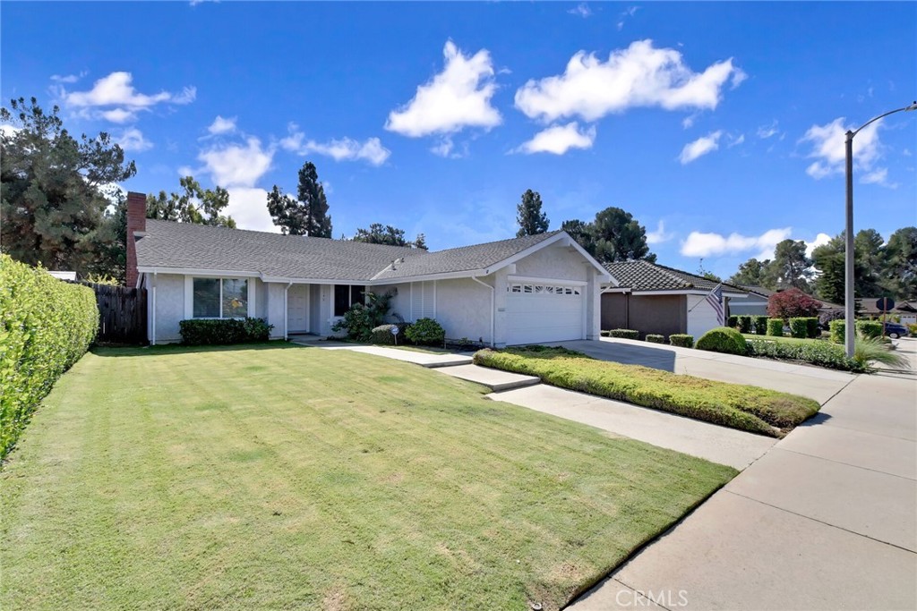 Don't miss this neat and spotless, upgraded, single story home, with no HOA, and with a sparkling swimming pool, and a golf course view. Features of this property include: great curb appeal, a concrete driveway, newer windows and doors, an open and airy floor plan, a living room with a fireplace, a separate family room/dining room combo, a completely remodeled kitchen with custom cabinets & counters, & stainless steel appliances, a main bedroom with its own bathroom, cathedral ceilings, central air conditioning and heating, mirrored wardrobe doors, newer paint and flooring, and a finished 2 car garage with pedestrian access to the home. The low maintenance back yard has garden rich soil, a pool, and great view of the golf course. This home is close to Walnut Creek Wilderness Park, equestrian & hiking trails, Via Verde Country Club and Golf Course, shopping, restaurants, Bonelli Regional Park with fishing & swimming & boating, Raging Waters Water Park, and easily accessible to the 10, 57, 71, and 210 freeways. Some photos have been digitally staged. Click on the virtual tour to view the floor plan.