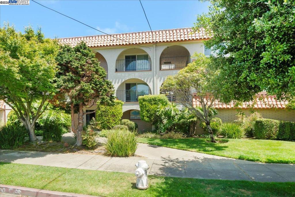 Prime Alameda Location! This spacious 2-bedroom, 2-bathroom condo is ideally situated just minutes from vibrant Park Street, top-rated schools, restaurants, transportation, a movie theater, and more. Located in a desirable neighborhood, the single-level unit sits on the second floor of a secure, elevator-equipped building with a heated central courtyard pool. Inside, the condo features crown molding, recessed lighting, granite countertops, and double-pane windows throughout. The popcorn ceilings have been removed for a more modern look. The open layout includes an eat-in kitchen, a separate dining area, and a full-size in-unit washer and dryer (not stackable). The primary suite offers both a walk-in closet and a mirrored wardrobe, while the en-suite bathroom includes a vanity and linen storage. Additional amenities include gated, assigned parking with extra storage, community bike storage, a common lobby, and convenient access to Highway 880. A perfect blend of comfort, style, and location—be ready to be impressed!