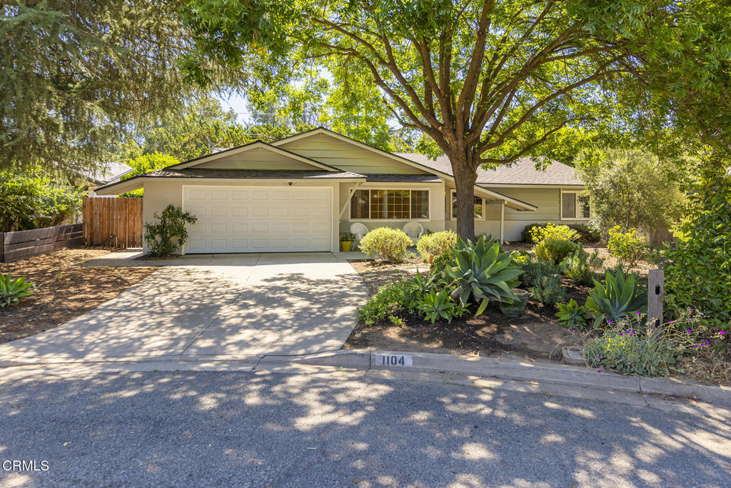Tucked at the end of a peaceful cul-de-sac in Ojai's most welcoming and family-oriented neighborhoods - The Oaks West. This charming residence offers comfort, versatility, and room to grow. Originally designed as a four-bedroom home, one room has been thoughtfully transformed into a cozy home office or den--perfect for remote work or quiet retreat--the converted room can easily be restored to a bedroom to suit your needs.Step inside to discover a bright, open-concept layout featuring a spacious kitchen with warm-toned cabinetry and a casual dining nook ideal for everyday meals. The home includes energy-efficient dual-pane windows, central HVAC and an attached two-car garage. The backyard offers a private, shaded and serene, park-like setting with ample space for a garden, play area, or future pool. Nestled in a safe, family-friendly community known for its walkability and welcoming atmosphere, this home is a wonderful opportunity to enjoy Ojai living at its best.
