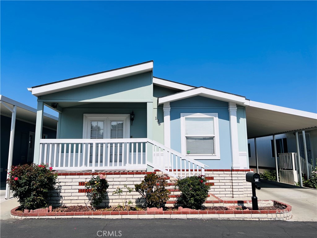 *** Beautiful Mobile Home Built in 2006 *** Well Maintained, Quiet Location *** Large living space, 1,320Sq.Ft. (54' + 56' x 24' = 1,320Sq.Ft.), 3 bedrooms + an extra room and 2 bathrooms, double-paned windows and blinds throughout, bright and airy, open floor plan, high ceilings. Wonderful kitchen with skylight, breakfast bar, dishwasher and stove. Living room with high ceilings and skylights, laminate flooring, formal dining room with ceiling fan and laminate flooring, indoor laundry room with built-in cabinets. Large master bathroom with hot tub and separate shower area. Central air conditioning and heating. Covered front porch, parking for 3 cars, low space fee: $1155 per month (including trash and sewer). Community pool and clubhouse, quiet family park, close to Rowland Park, supermarket, public transportation and schools. Easy access to 60, 10 and 57 freeways. *** Don't miss this great deal! ***